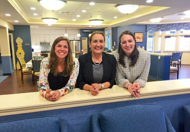 Kerry mills, founder of Engaging Alzheimers smiles for a photo with Jean Dunphy, General Manager, and Sarah Rourke, Director of the Memory Care unity at The Ambassador